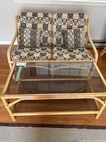 Loveseat and coffee table together showing materials and design