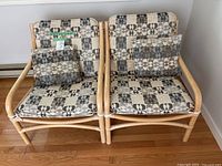 front view of both chairs with cushions and pillows visible