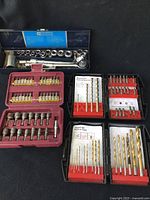 Full overview photo of drill bits sets and socket set