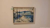 Full view of framed watercolor painting on wall