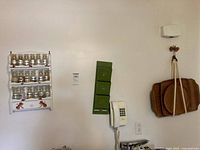 Overall wall view showing spice rack, letter organizer, wooden trays