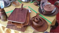 Group view of cutting boards, divided tray and nutcracker set
