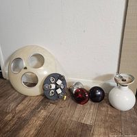 Full set of two vintage fixtures with bulbs and wiring laid on floor.