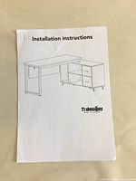 Installation instruction manual showing the assembled desk shape and components.