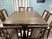 Square configuration of table with all eight chairs around