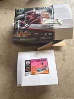 Original packaging of the inflatable riding bull laid open with box showing bull image and description.