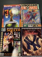 Five vintage sports programs including Soccer and Baseball themes with colorful covers