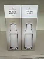 Two boxed Holme Gaard Minima bottles, each 80 cl capacity