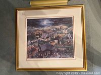 Front view of framed limited edition print with picture light