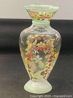 Full view of the Tracy Porter glass vase showing its shape and overall floral and butterfly hand painted design on clear glass.