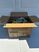 Closed box containing the Happy Meal toys and collectibles from 90s-2000s