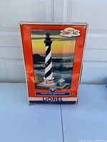 Front view of the original Lionel Operating Lighthouse 6-14087 box showing the lighthouse image and branding