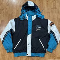 Full jacket front view showing colors, pockets, and elastic cuffs.