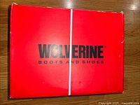 Red Wolverine branded box containing the boots.
