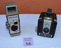 Front view of both cameras, Kodak Brownie Hawkeye and Bell & Howell 8mm movie camera, showing brands and main features.
