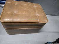 Front angled view of ottoman closed