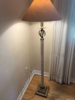 Full view of floor lamp showing overall design and size in room corner.