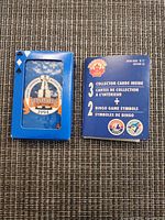 Front view of Stanley Cup playing card box beside Nabisco collector card package