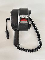 Brinkmann Q-Beam spotlight showing body, handle and 12 V cord