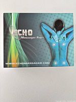 Front of product box showing Echo Massager Pro branding