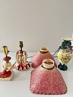 Full lot: two figural lamp bases, two shades, one vase