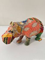 Left side view of handstitched patchwork hippo sculpture