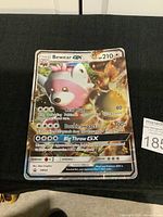 Photo showing Bewear GX Pokémon GX Holo Promo card from 2017 with holo foil, card number SM34.