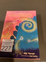 Photo showing front cover of The Never Girls Collection #1 boxed set with author Kiki Thorpe and illustrator Jana Christy credited.