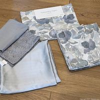 Overall view of all placemats, tablecloths, and runner showing fabric and pattern