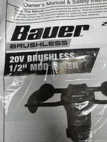 Owner's manual in plastic wrapping with Bauer 20V Brushless 1/2 inch Mud Mixer branding