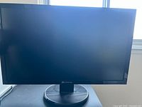 Front view of Gateway 27-inch LCD monitor powered off showing design and bezel.