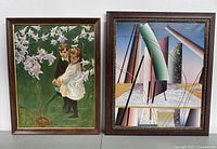 Photo showing two framed original paintings on canvas positioned side by side against a white wall. Left painting depicts two children with white flowers. Right painting is geometric abstract.