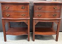 Front view of both vintage mahogany nightstands side by side