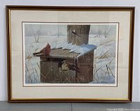 Full view of the framed print showing the winter scene with birds on a wooden birdhouse, matted and framed.