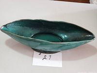 Full view of elongated Danesi blue-green ceramic vase/planter