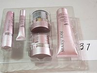 Overall view of five Mary Kay products in plastic tray