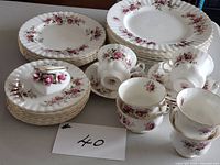Entire set showing stacks of plates, cups, saucers, trinket box