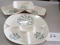 Divided dish with three individual dishes displayed