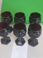 Six ruby red Avon Cape Cod goblets front view