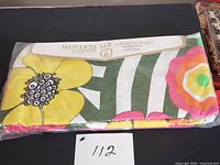 Front view of sealed Wondercale Springmaid sheet package showing floral pattern