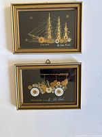 Both framed 3D collages showing intricate detail of watch parts forming images. The top collage shows the Cutty Sark ship and the bottom shows the 1904 Packard automobile.