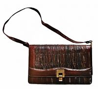 Front view of vintage brown eel skin leather handbag with ruched pleated detailing and gold tone flip clasp.