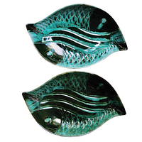 Pair of blue-green drip glaze fish shaped pottery platters with textured scales and embossed BMP underneath, shown stacked