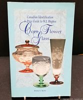 Front cover of the book showing title and glassware images