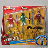 Front view of new in package Imaginext Power Rangers Battle Pack showing four figures and weapons in colorful packaging.