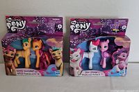 Two My Little Pony figure sets in original packaging including Sunny Starscout & Hitch Trailblazer and Zipp Storm & Princess Petals