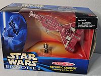 Front view of the Star Wars Episode I Action Fleet Republic Cruiser in original packaging showing ship and Qui-Gon Jinn figurine.