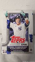 New and sealed Topps 2025 Series 1 Baseball Blaster Box with 7 packs, each containing 12 cards, totaling 84 cards