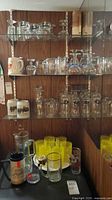 Entire shelving unit showing assorted glassware