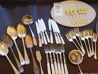 Full lot overview showing all 30 flatware pieces